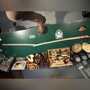 Hiking stick from driftwood and red/blue paracord handing and gap filler style.